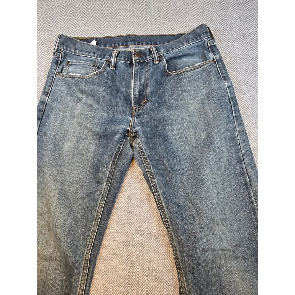 Levis 559 Relaxed Straight Jeans Mens 33x34 Medium Wash Blue Distressed Thrashed
